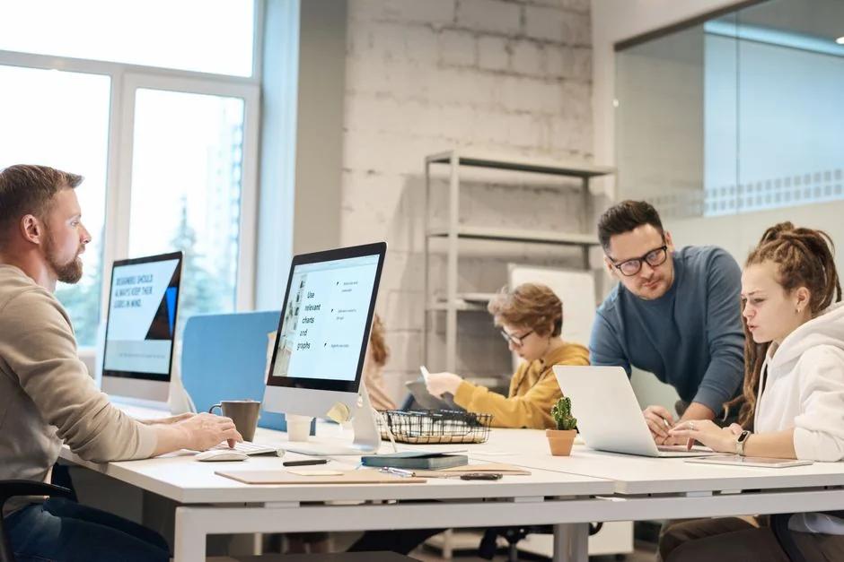 A tablet displaying a financial website, paired with a white keyboard and mouse. Perfect for stock images with a tech theme.